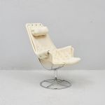 Fåtölj, Bruno Mathsson (1907-1988), Sverige. Jetson, Dux, stomme av kromad metall, sits av kanvas med läderskoning, etikettmärkt, läder